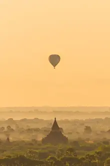 Hot Air Balloon Prints: A balloon flying over Bagan, Myanmar