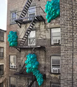 Balloons popping out through windows