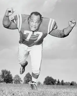 Intimidation Prints: Baltimore Colts Offensive Lineman Jim Parker Lunging