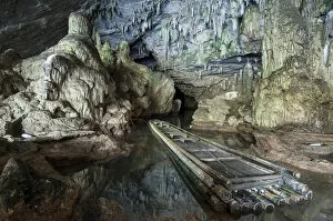 Images Dated 17th November 2011: Bamboo raft for transporting people, cave formation, stalactites, stalagmites, Tham Lot Cave