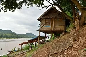Images Dated 8th December 2015: bamboo stlits house on mekong river luang prabang Laos