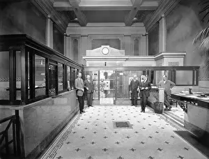 Bank With Officers In Front Of Open Safe
