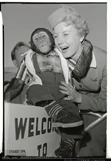 Barbara Behremdt Holding a Chimpanzee