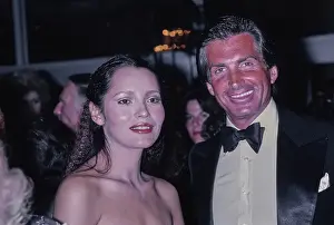 Huty35670 Prints: Barbara Carrera & George Hamilton