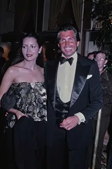 Huty35670 Prints: Barbara Carrera & George Hamilton