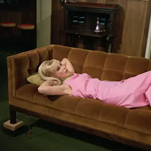 Barbara Eden Relaxing on Sofa