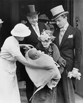 Barbara Hutton Holding Infant