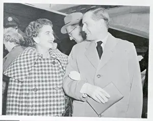 Barbara Hutton Walking Arm in Arm with Her Husband