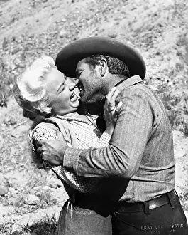 Barbara Payton and Tom Neal in Scenes from The Great Jesse James Raid