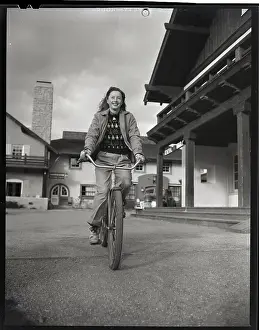 Barbara Stanwyck Riding A Bicycle