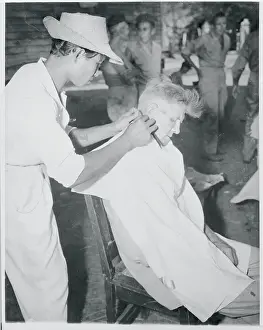Barber Cutting Man's Hair