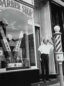 A Barber Yells the Announcement of Italy's Surrender