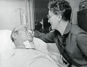 Barney Clark Being Visited by His Wife