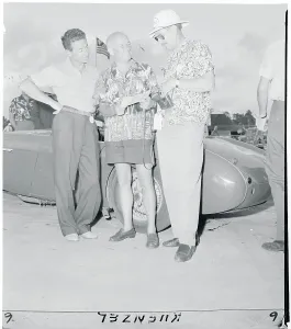 Nassau Prints: Baron Huschke von Hanstein Speaking With Colleagues