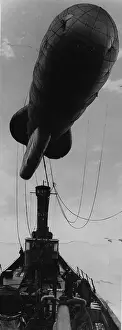 Prints of 14th February 1942: A barrage balloon in the estuary. Original Publication: Picture Post - 1021 - Balloons In The Estuary - pub. 1942 (Photo by Haywood Magee/Picture Post/Hulton Archive/Getty Images) Discover the Vision of Haywood Magee – A Master of Mid-Century British Life: Barrage Balloon