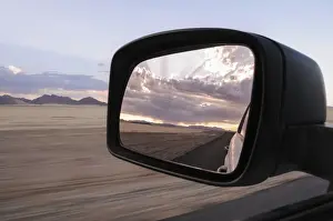 barren, car, color image, colour image, desert, dramatic sky, dune, elevated view
