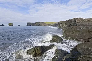 Volcano Collection: Basalt cliffs and a rock arch on the coast, Dyrholaey, Vik i Myrdal, Southern Region, Iceland