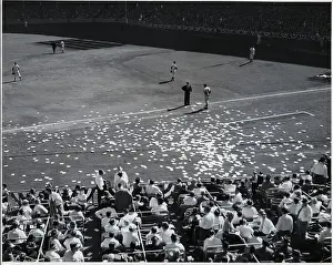 Baseball Field Littered With Papers