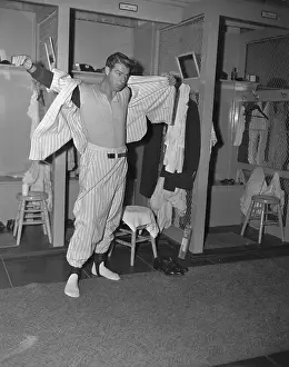 Baseball Great Joe DiMaggio Dressing in Locker Room
