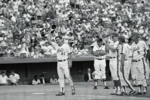 Baseball Greats on Field During Game