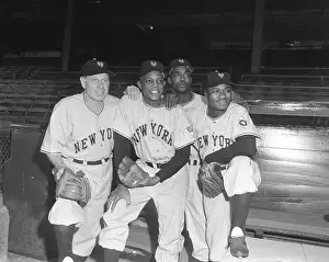 Baseball Greats Holding Baseball Gloves