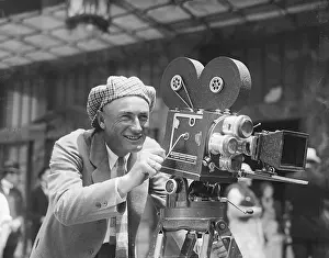 Baseball Manager Bert Ellison Operating Camera