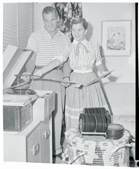 Baseball Player Al Rosen and Wife Enjoying Music at Home