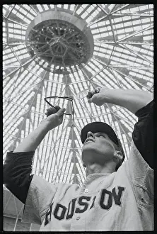 Baseball Player Bob Lillis Holding Sunglasses Towards Dome