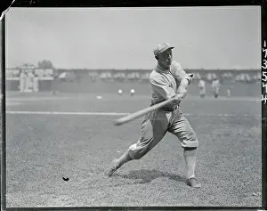 Baseball Player Clarence Walker Swinging Bat