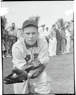 Baseball Player Clydell Castleman Posing in Uniform