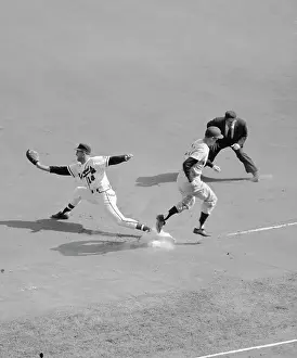 Baseball Player Crossing Base in Time
