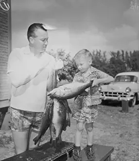 Fisherman Prints: Baseball Player Duke Snider Showing His Son a Fish