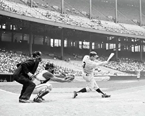 Baseball Player Harmon Killebrew Batting During Game