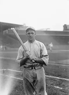 Baseball Player Holding Bat