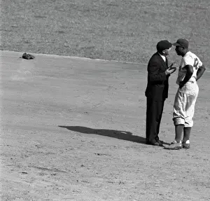 Baseball Player Jackie Robinson Argues with Umpire