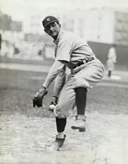 Pitcher Prints: Baseball Player Joe Jackson Preparing to Pitch