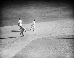 Baseball Player Rounding Second Base
