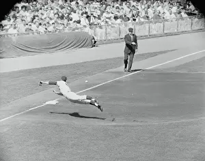Baseball Player Scrambling on the Field