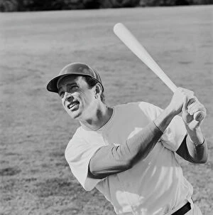 Images Dated 20th July 2011: Baseball player swinging baseball bat