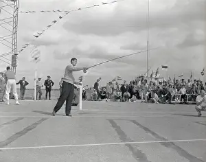 A Home Run of History: Baseball Player Ted Williams Fly Casting with Fishing Rod
