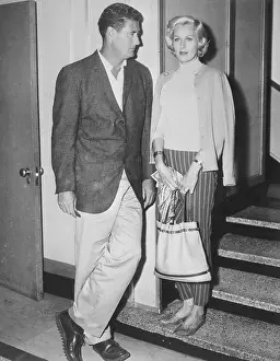 Baseball Player Ted Williams Standing on Steps with His Wife Lee