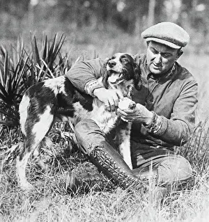 Injury Prints: Baseball Player Ty Cobb Fixing Injured Dog's Paw