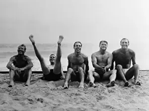 Five Baseball Players At The Beach