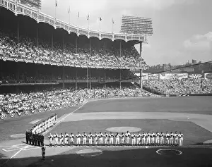 Baseball Players and Fans Bowing Their Heads in Prayer