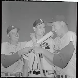 Baseball Players Posing with Bats
