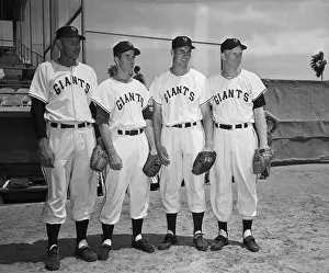 Baseball Players Posing in Uniforms