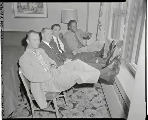 Hank Aaron Prints: Baseball Players Sitting in Hotel Room
