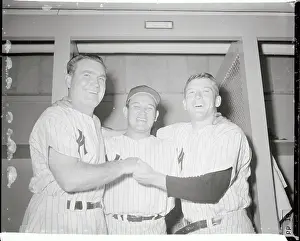 Baseball Players Smiling in Locker Room