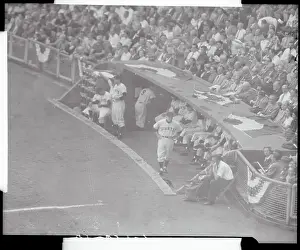 Baseball Players Standing in the Dugout