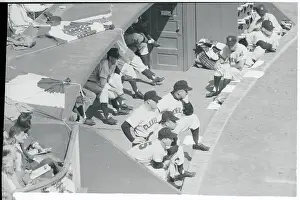 Baseball Players Standing in the Dugout